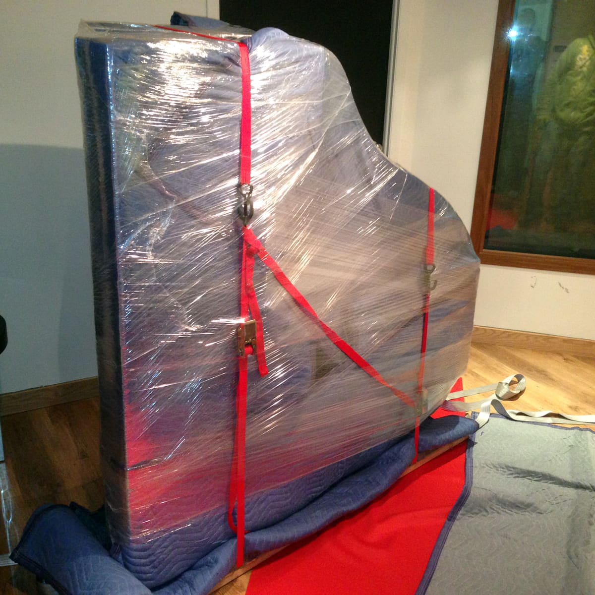 Careful furniture wrapping before loading
